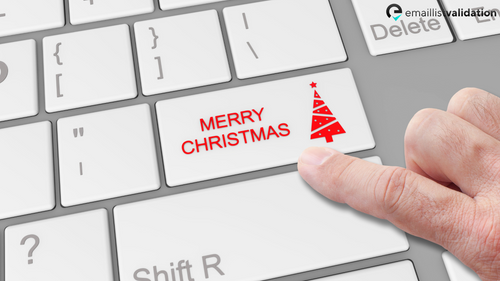 person clickingon Merry Christmas button 